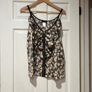 Floral ruffle front zipper racerback tank